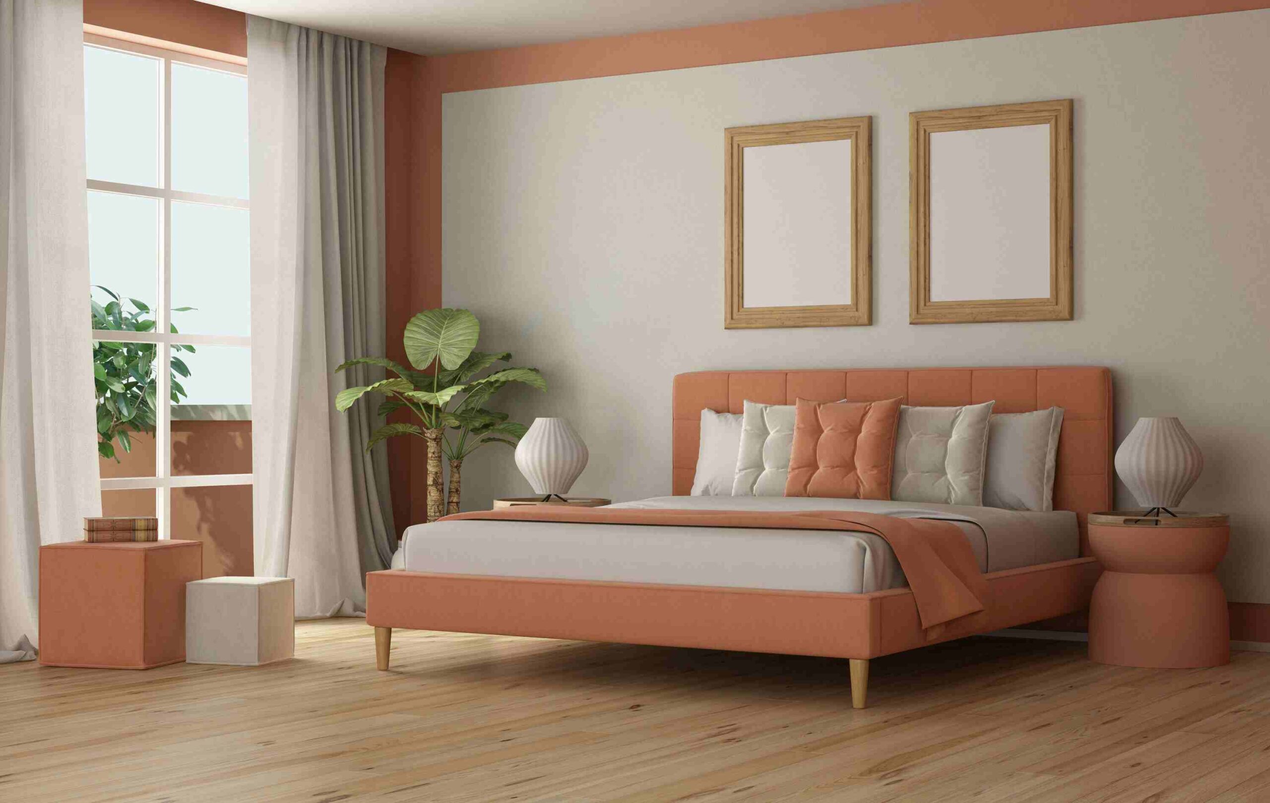 Imagen de un cuarto con cama grande de colores durazno o peach fuzz y blanco, el piso es de madera y la pared es blanca con una ligera linea en el marco color durazno. Se encuentra una planta a la izquierda de la cama, la imagen da una sensación de calidez.